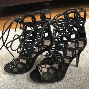 Caged lace up black high heels